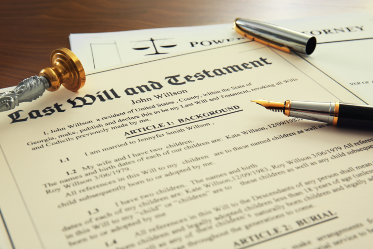 Document with heading: Last Will and Testament, over a Power of Attorney form, with a fountain pen and seal stamp