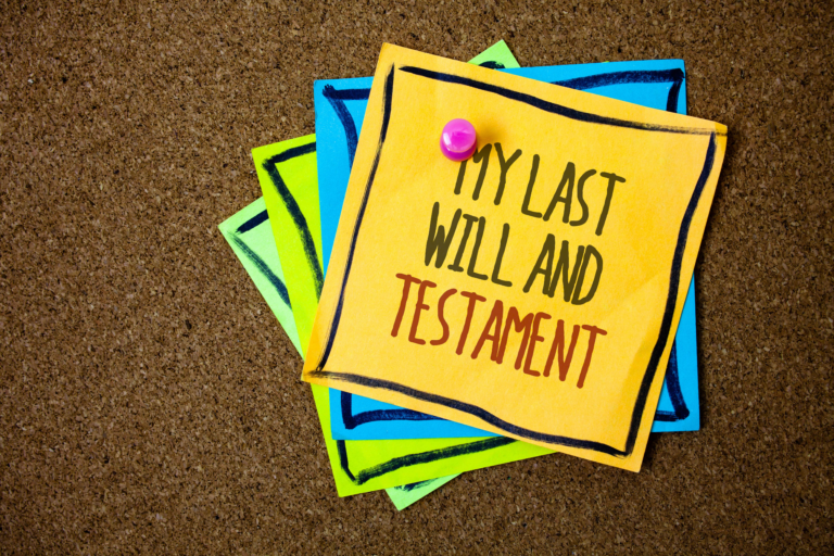 Sticky note pinned to a corkboard reading My Last Will and Testament