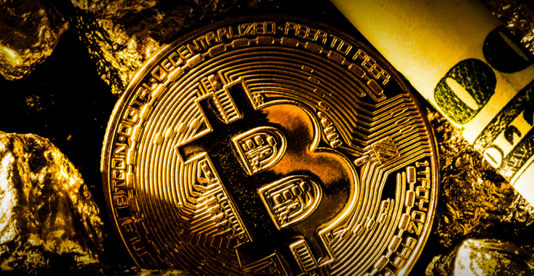 Bitcoin coin among gold nuggets and a rolled banknote